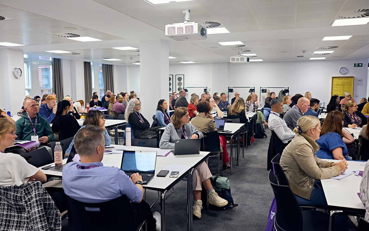 People sat at tables during an event