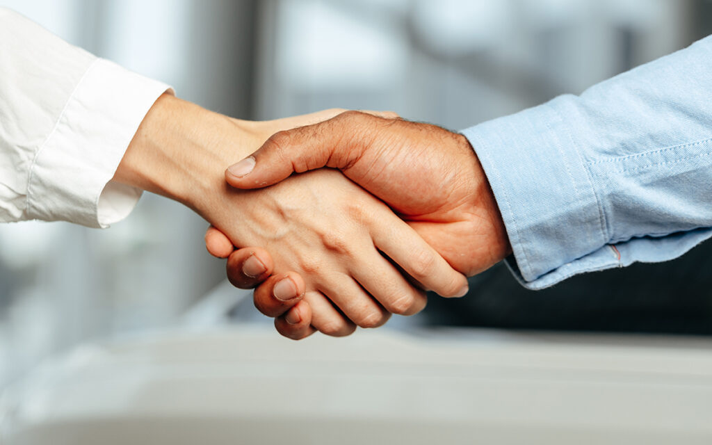 Two people shaking hands